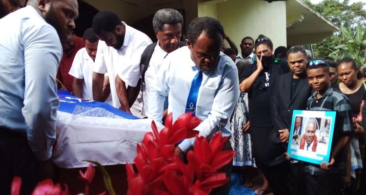 The coffin leaving Malasitapu Presbyterian Church for burial